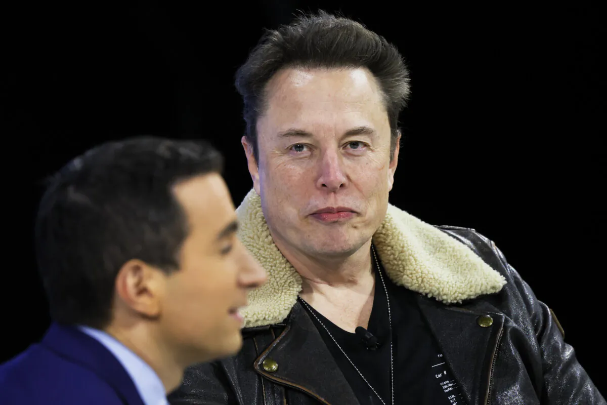 New York Times columnist Andrew Ross Sorkin (L) and CEO of Tesla, Chief Engineer of SpaceX, and X owner Elon Musk speak during the New York Times annual DealBook summit in New York on Nov. 29, 2023. (Michael M. Santiago/Getty Images)
