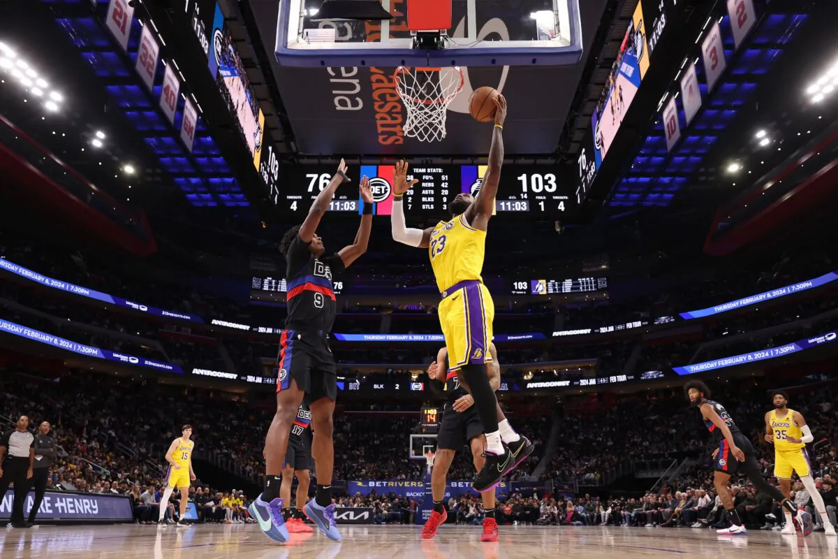 LeBron James (23) of the Los Angeles Lakers drives to the basket against Ausar Thompson (9) of the Detroit Pistons during the second half in Detroit on Nov. 29, 2023. (Gregory Shamus/Getty Images)