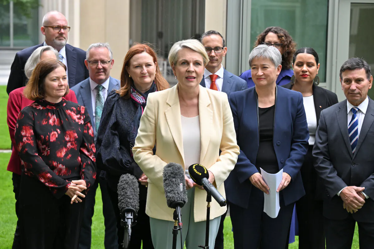 Minister for Environment Tanya Plibersek and government members and senators at a press conference at Parliament House in Canberra, Australia on Nov. 30, 2023. (AAP Image/Mick Tsikas)