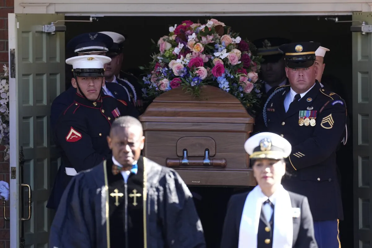 An Armed Forces body bearer team carries the casket after the funeral service for former First Lady Rosalynn Carter at Maranatha Baptist Church in Plains, Ga., on Nov. 29, 2023. (John Bazemore/AP Photo)