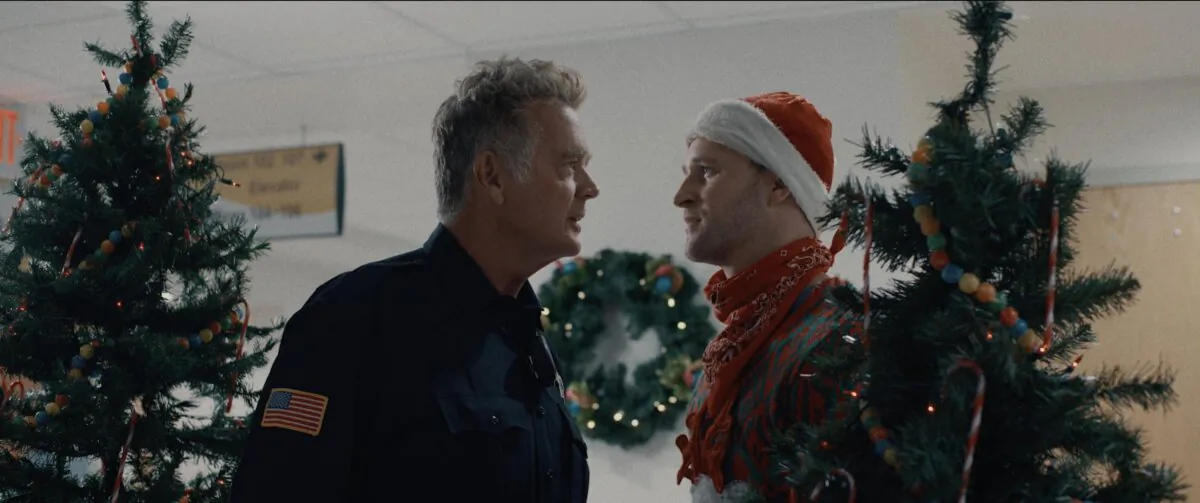 Dusty (John Schneider, L) and Nick Gutman (Ben Davies), in “Jingle Smells.” (ACLJ Films)