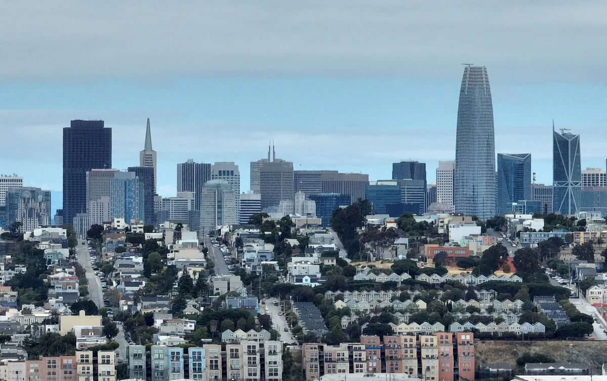 In an aerial view, homes stand in front of the San Francisco skyline in San Francisco on June 9, 2023. (Justin Sullivan/Getty Images)