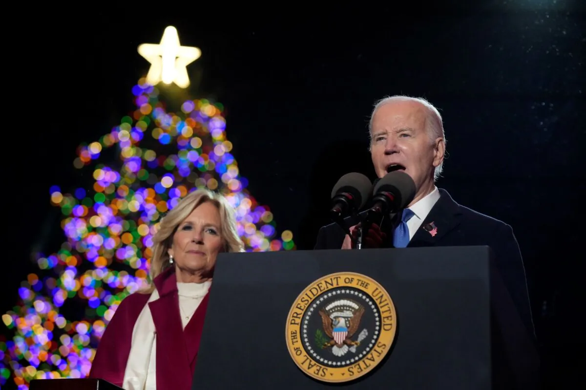 President Joe Biden speaks as First Lady Jill Biden listen after they lit the National Christmas Tree on the Ellipse near the White House in Washington on Nov. 30, 2023. (Andrew Harnik/AP Photo)