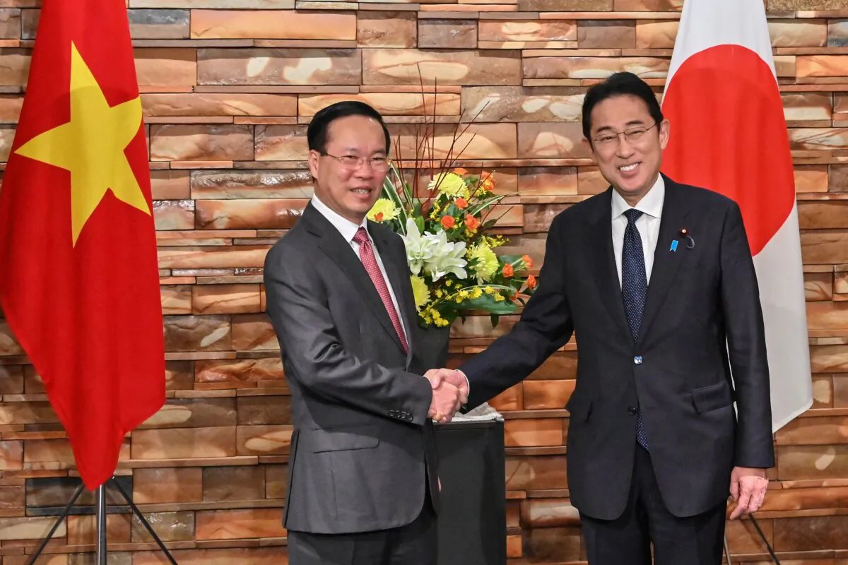Vietnam's President Vo Van Thuong (L) is welcomed by Japan's Prime Minister Fumio Kishida during his visit to the prime minister's official residence in Tokyo on Nov. 27, 2023. (Richard A. Brooks / POOL / AFP via Getty Images)