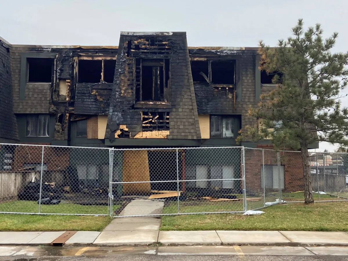 Fencing surrounds The Brookhollow Apartment building in Wichita, Kan., where Paoly Bedeski was killed in a fire on Oct. 13, 2023. (Jaime Green/The Wichita Eagle via AP)