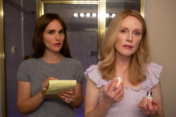 two women in front of a mirror in MAY DECEMBER