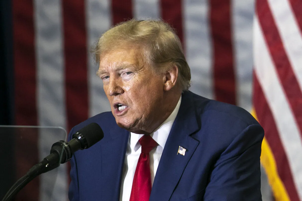Republican presidential candidate and former President Donald Trump speaks to the crowd during a caucus event at Kirkwood Community College in Cedar Rapids, Iowa, on Dec. 2, 2023. (Geoff Stellfox/The Gazette via AP)