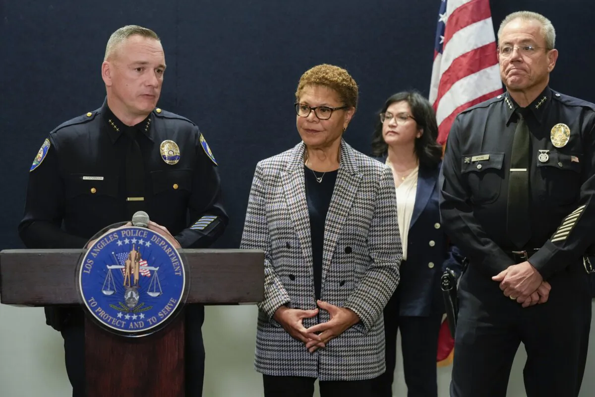 Beverly Hills Police Chief Mark Stainbrook (L), Los Angeles Mayor Karen Bass, and Los Angeles Police Chief Michel Moore announce the arrest of a suspect in three recent killings of homeless men in Los Angeles, on Dec. 2, 2023. (Damian Dovarganes/AP Photo)