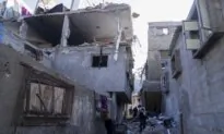 Humanitarian Aid for Palestinians and Israeli Hostages Arrives in Gaza; Fighting Rages