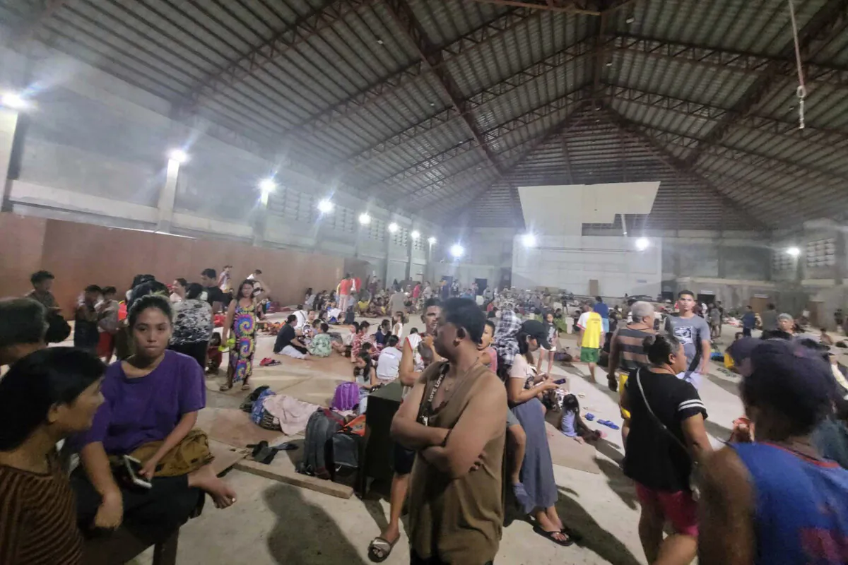 Villagers stay inside a temporary evacuation center at Hinatuan town, Surigao del Sur province, southern Philippines, on Dec. 2, 2023. (Local Government Unit of Hinatuan via AP)