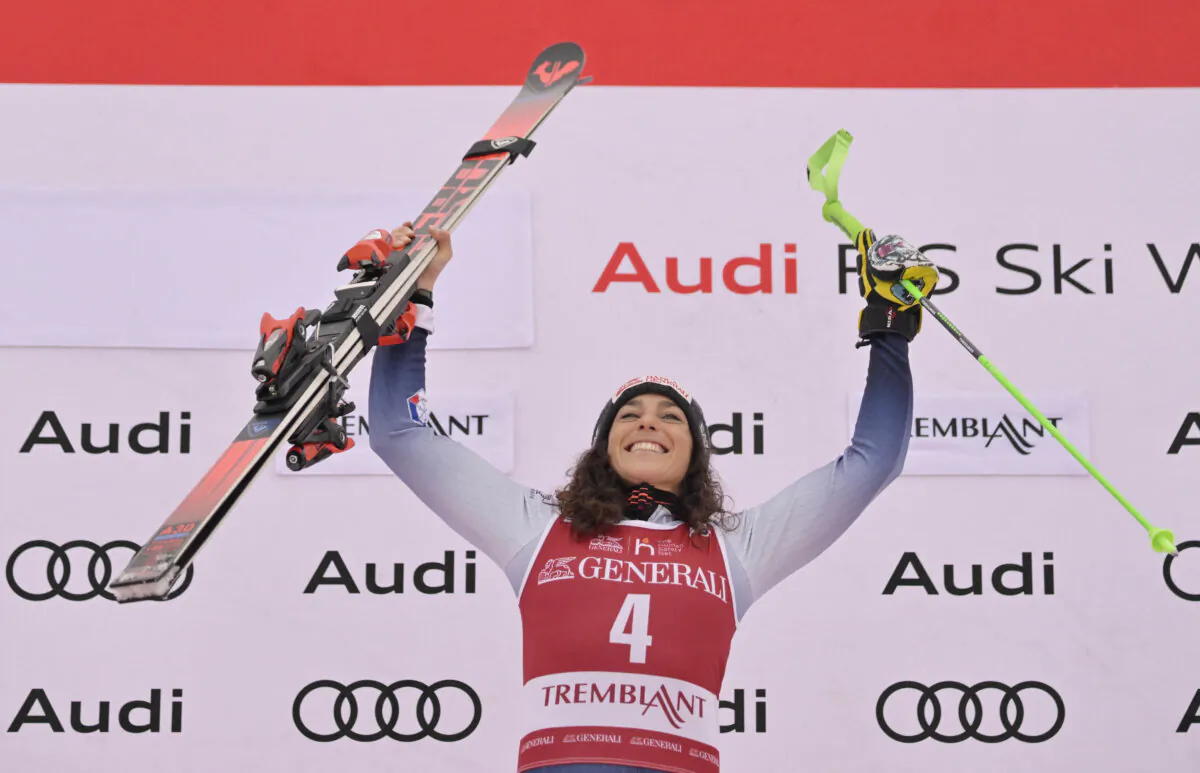 Federica Brignone of Italy celebrates her first place finish in the giant slalom race in the women's alpine skiing World Cup at Mont Tremblant in Quebec, Canada, on Dec. 2, 2023. (Eric Bolte/USA TODAY Sports via Reuters)