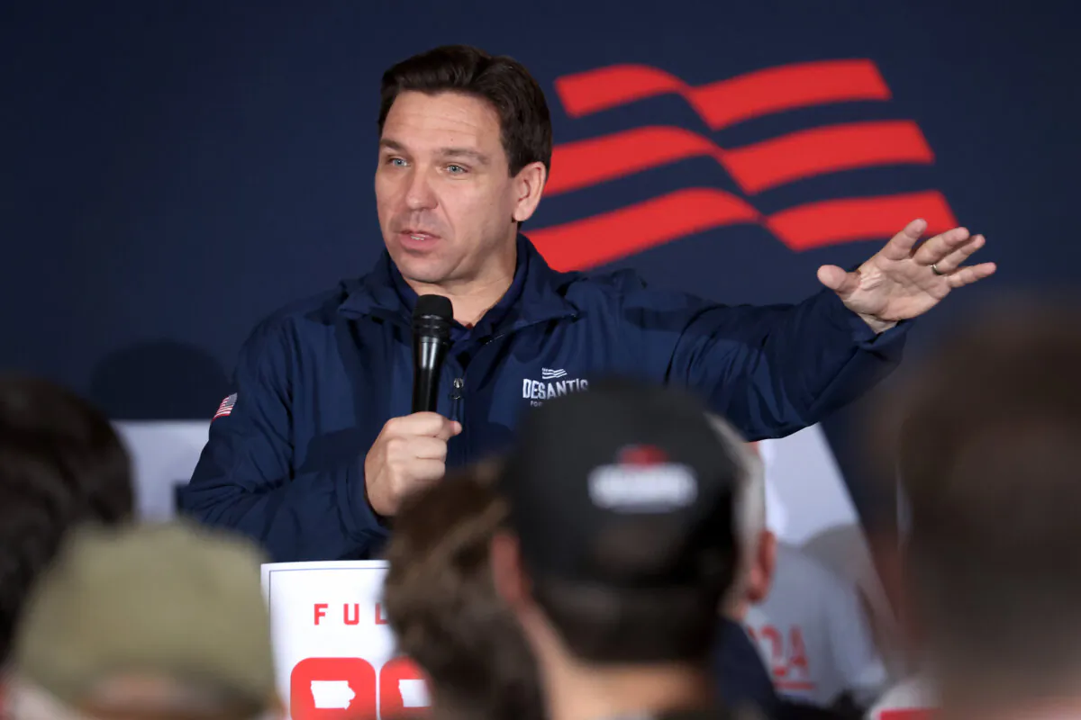 Republican presidential candidate Florida Gov. Ron DeSantis speaks to guests during a campaign rally at the Thunderdome in Newton, Iowa, on Dec. 2, 2023. (Scott Olson/Getty Images)