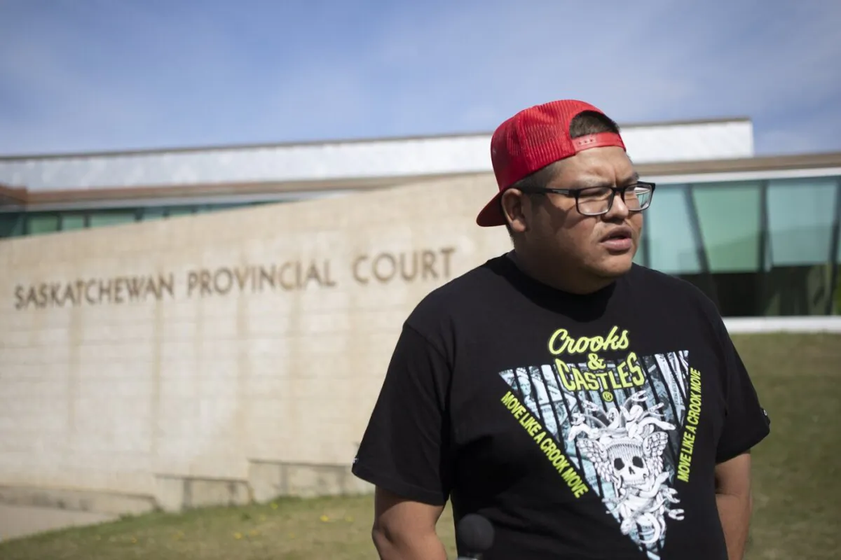 Brett Herman, brother of Braden Herman, speaks to the media outside the Saskatchewan Provincial Courthouse in Prince Albert, Sask., on May 13, 2021. (The Canadian Press/Kayle Neis)