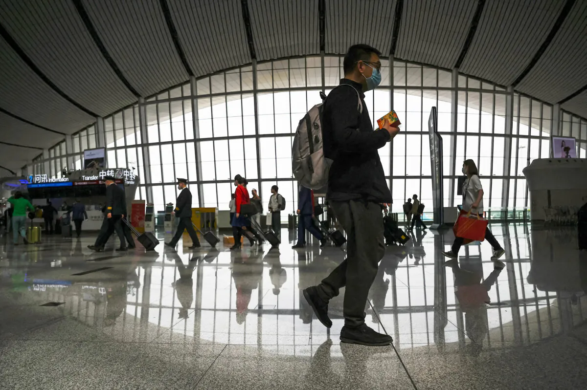 Passengers at Beijing Daxing International Airport in China's capital city on April 28, 2023. (Jade
Gao/AFP via Getty Images)