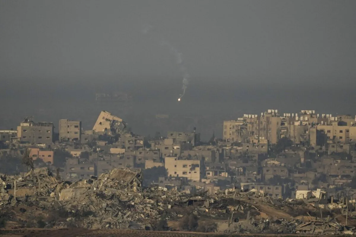 An Israeli army flare is seen over the Gaza Strip, as seen from southern Israel, Dec. 3, 2023. (The Canadian Press/AP, Leo Correa)