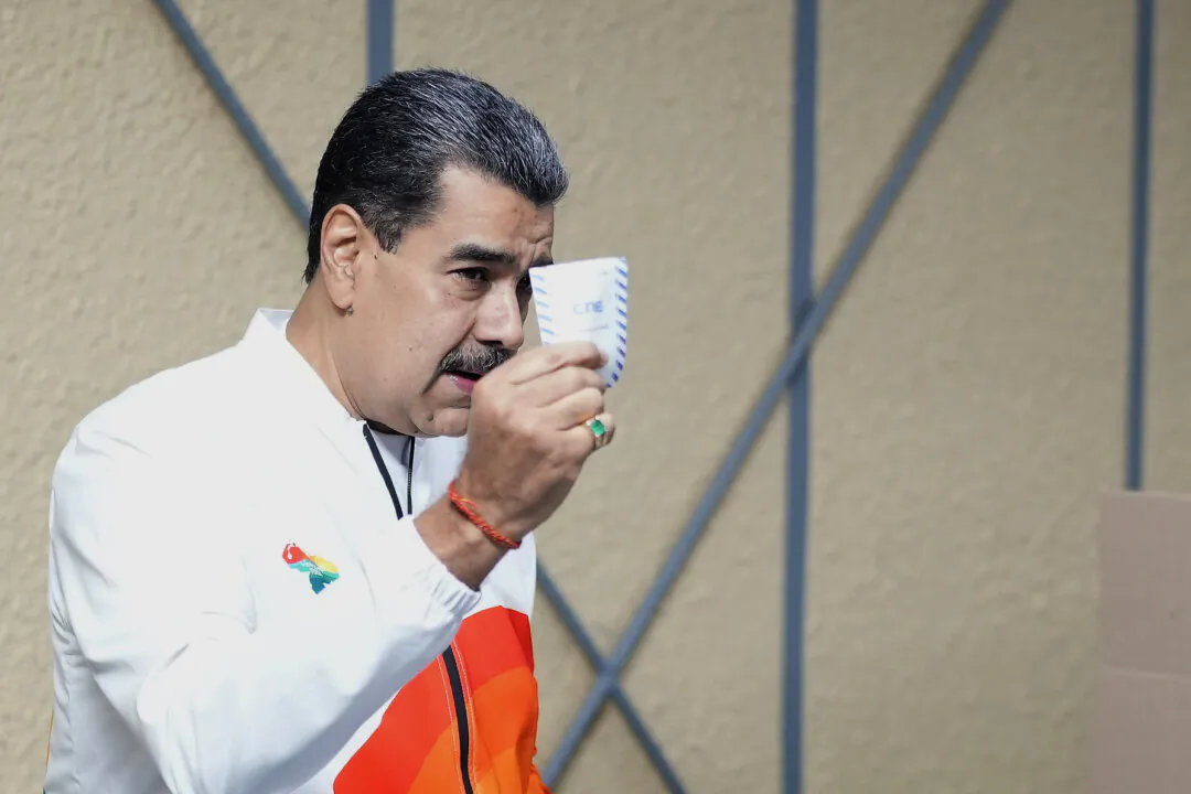 President Nicolas Maduro votes in a referendum regarding Venezuela's claim to the Essequibo, a region administered and controlled by Guyana, in Caracas, Venezuela, on Dec. 3, 2023. (AP Photo/Matias Delacroix)