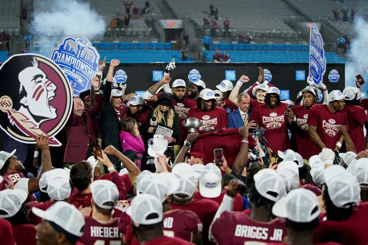 Florida State celebrates after defeating Louisville in the Atlantic Coast Conference championship NCAA college football game in Charlotte, N.C., on Dec. 2, 2023. (Erik Verduzco/AP Photo)