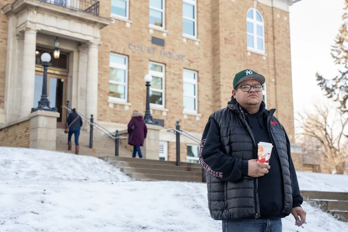 Brett Herman, brother of Braden Herman who was killed in May of 2021, stands for a photograph outside of the Court of King's Bench in Prince Albert, Sask., on Dec. 4, 2023. (The Canadian Press/Liam Richards)