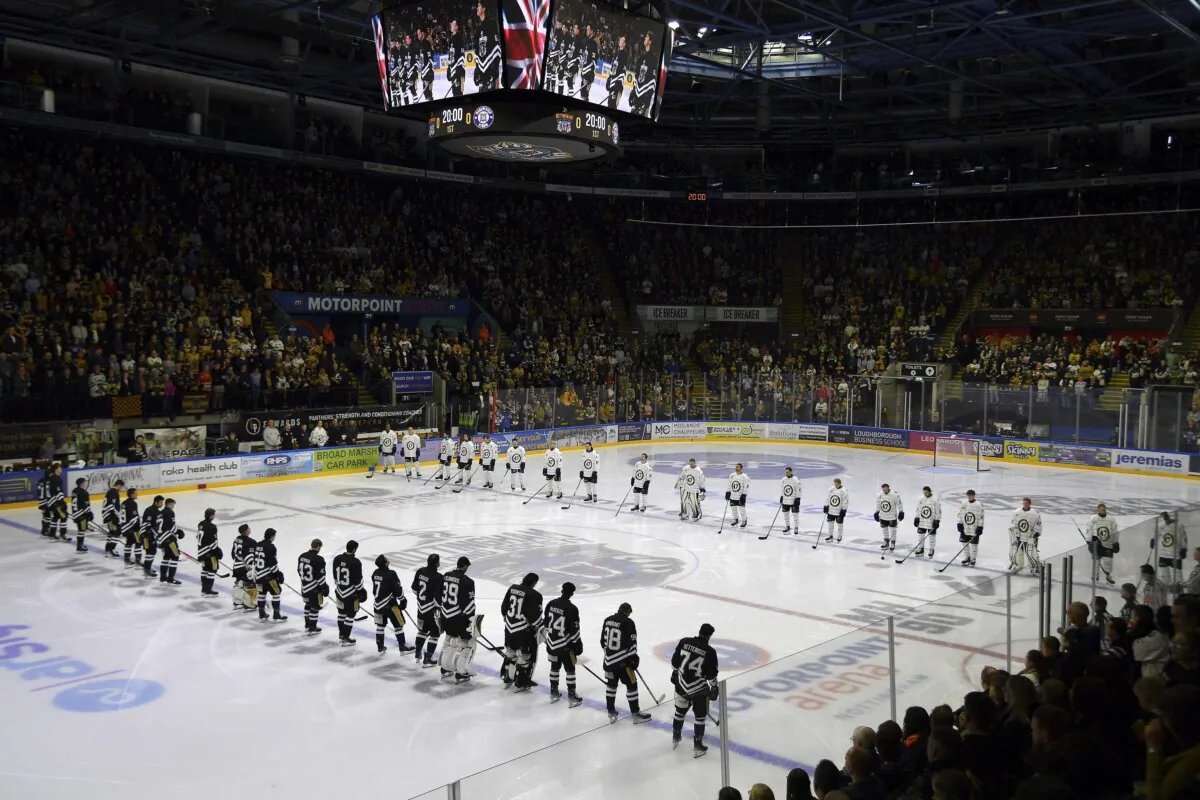 Nottingham Panthers players wearing number 47, Adam Johnson's number, pay tribute before the Ice Hockey Adam Johnson memorial game between Nottingham Panthers and Manchester Storm at the Motorpoint Arena in Nottingham, England, on Nov. 18, 2023. (Rui Vieira/AP Photo)
