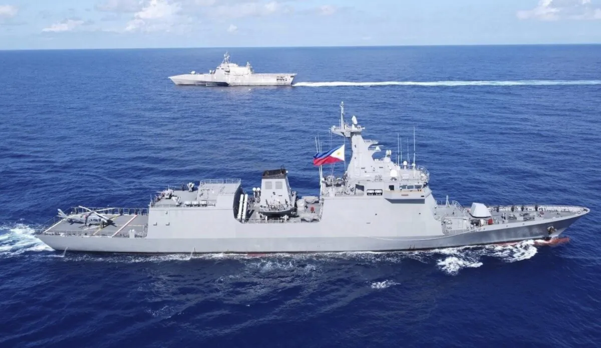 Philippines BRP Jose Rizal (FF150) (R) and USS Gabrielle Giffords (LCS 10) during a tactical exercise between Philippines and the United States in the West Philippine Sea on Nov. 23, 2023. (Armed Forces of the Philippines via AP)