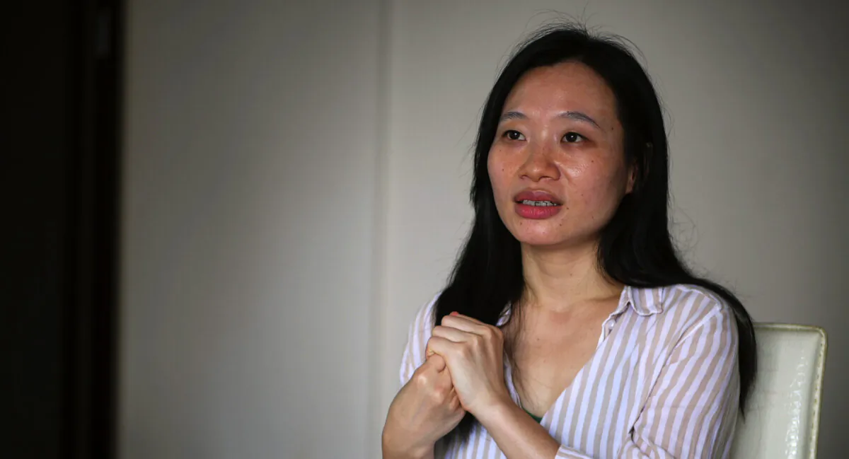 Sophia Huang, in "Total Trust." Ms. Huang is not one of the mainland Chinese who trust the CCP. (Film Movement)