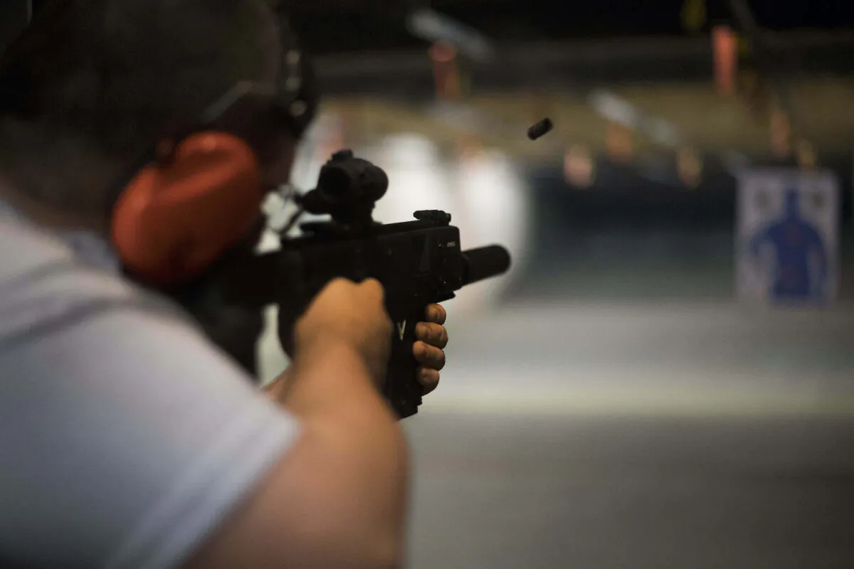 A recreational shooter fires his gun at the Lynchburg Arms & Indoor Shooting Range in Lynchburg, Va., on Oct. 20, 2017. (Jim Watson/AFP via Getty Images)