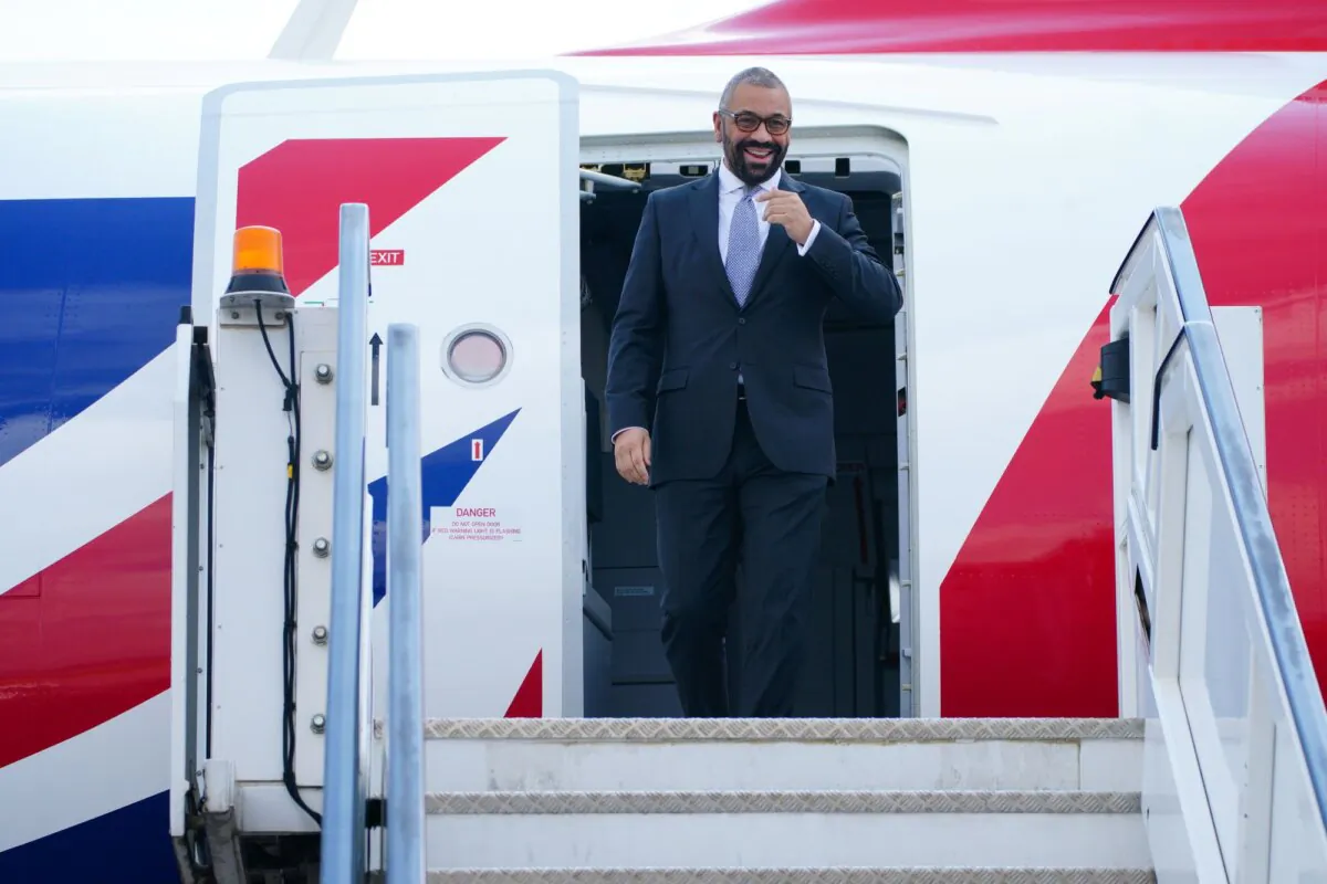 British Home Secretary James Cleverly arrives in Kigali, Rwanda, on Dec. 5, 2023. (PA)