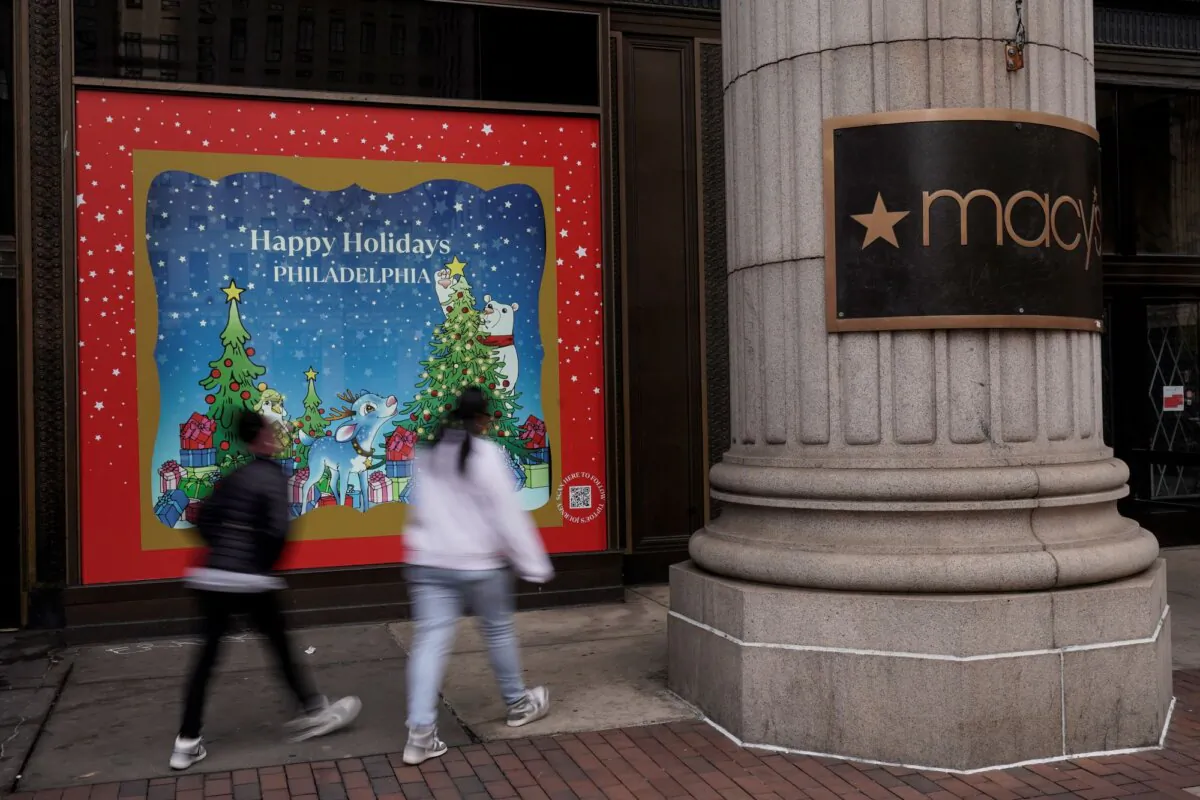 Shoppers walk to closed Macy's retail location after reports of an alleged stabbing at the department store, in Philadelphia on Dec. 4, 2023. (Matt Rourke/AP Photo)