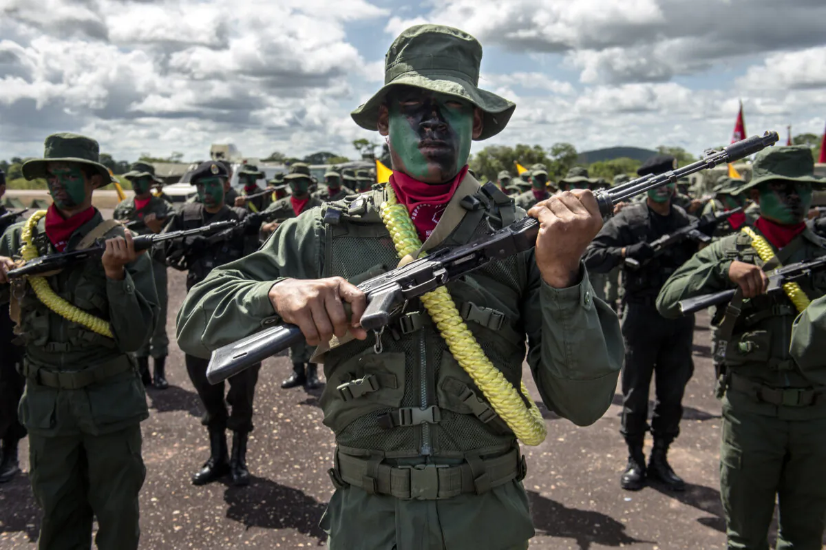 Members of the Venezuelan Army Special Forces take part in a military parade in Tumeremo, Venezuela, about 90 km from the border with Guyana on July 21, 2015. (Federico Parra/AFP via Getty Images)