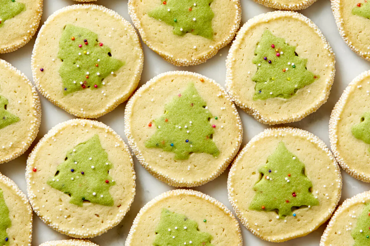 These slice-and-bake cookies reveal a snowy Christmas tree decked out with twinkly lights. (Alex Lepe/TNS)