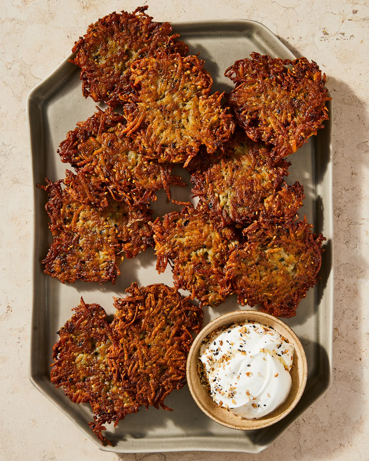 An everything bagel walked into a potato and created the most delicious latke. (Julia Gartland/TNS)