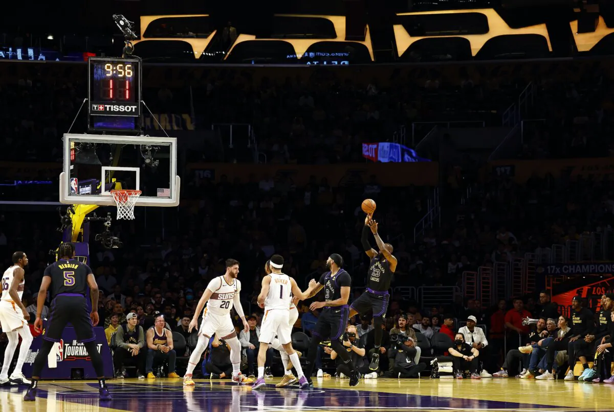 LeBron James (23) of the Los Angeles Lakers takes a shot against the Phoenix Suns in the first half during the 2023 NBA In-Season Tournament quarterfinals in Los Angeles on Dec. 5, 2023. (Ronald Martinez/Getty Images)