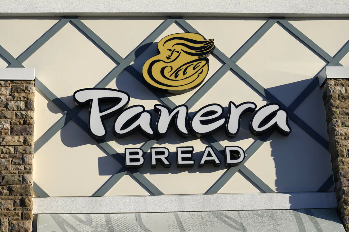 A Panera Bread logo is attached to the outside of a Panera Bread restaurant location in Westwood, Mass., on Dec. 20, 2022. (Steven Senne/AP Photo)