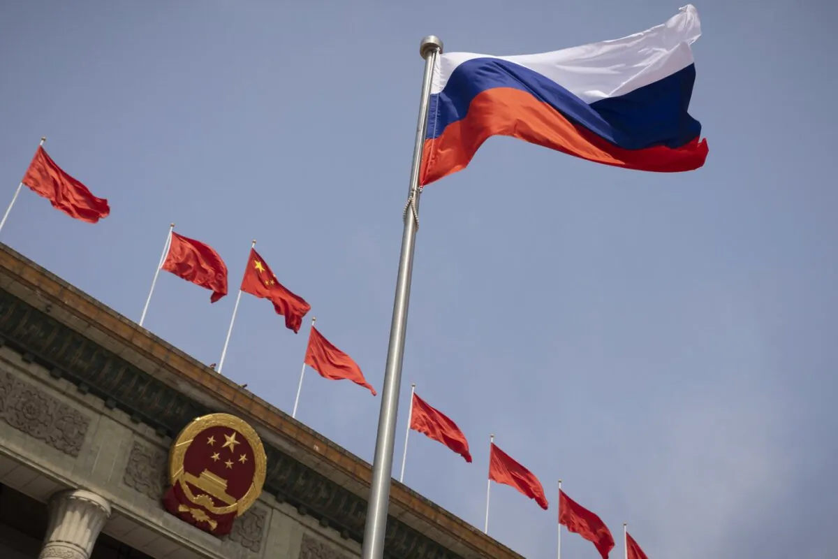 The Russian national flag flies in front of the Great Hall of the People before a welcoming ceremony for Russian Prime Minister Mikhail Mishustin in Beijing, China, on May 24, 2023. (The Canadian Press/Thomas Peter/Pool Photo via AP)
