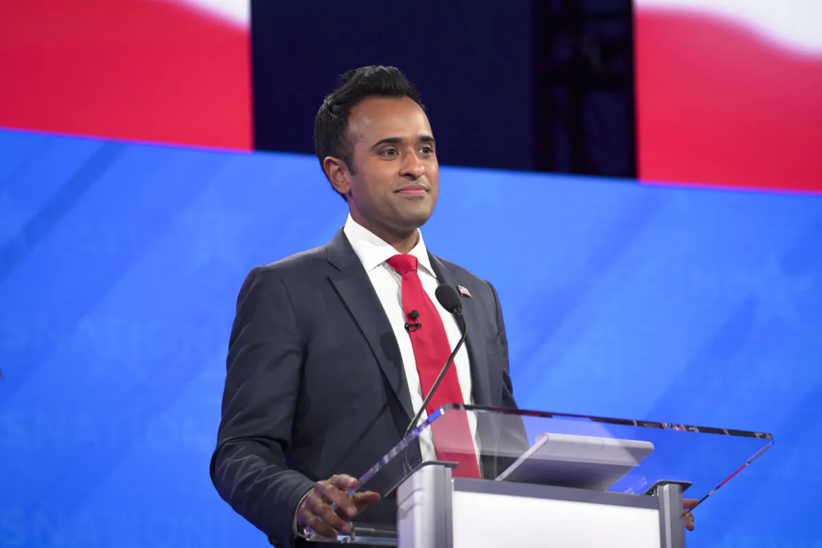 Republican presidential candidate Vivek Ramaswamy prepares to take the debate stage in Tuscaloosa, Ala., on Dec. 6, 2023. (Madalina Vasiliu/The Epoch Times)