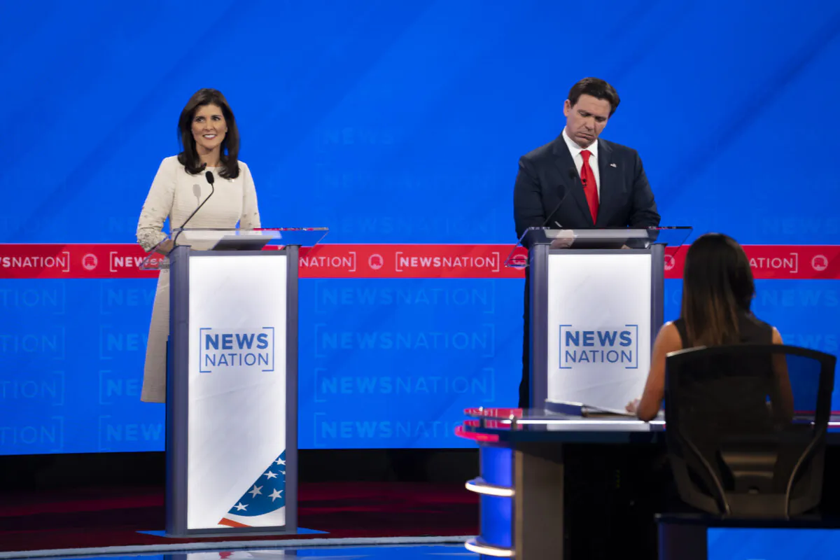 Republican presidential candidates, former South Carolina Gov. Nikki Haley (L) and Florida Gov. Ron DeSantis (R) participate in the fourth GOP presidential primary debate at the University of Alabama in Tuscaloosa, Ala., on Dec. 6, 2023. (Madalina Vasiliu/The Epoch Times)