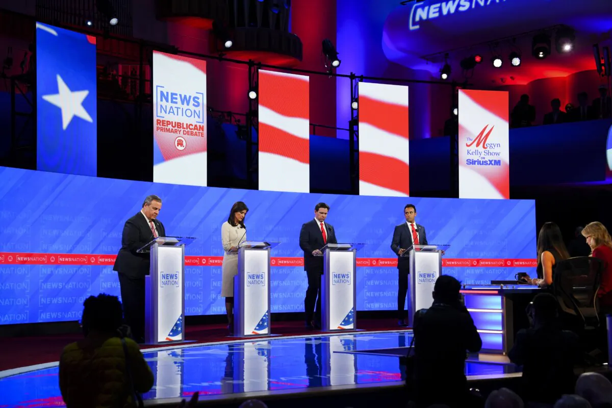 Republican presidential candidates (L-R) Chris Christie, Nikki Haley, Ron DeSantis, and Vivek Ramaswamy prepare to take the debate stage in Tuscaloosa, Ala. on Dec. 6, 2023.(Madalina Vasiliu/The Epoch Times)