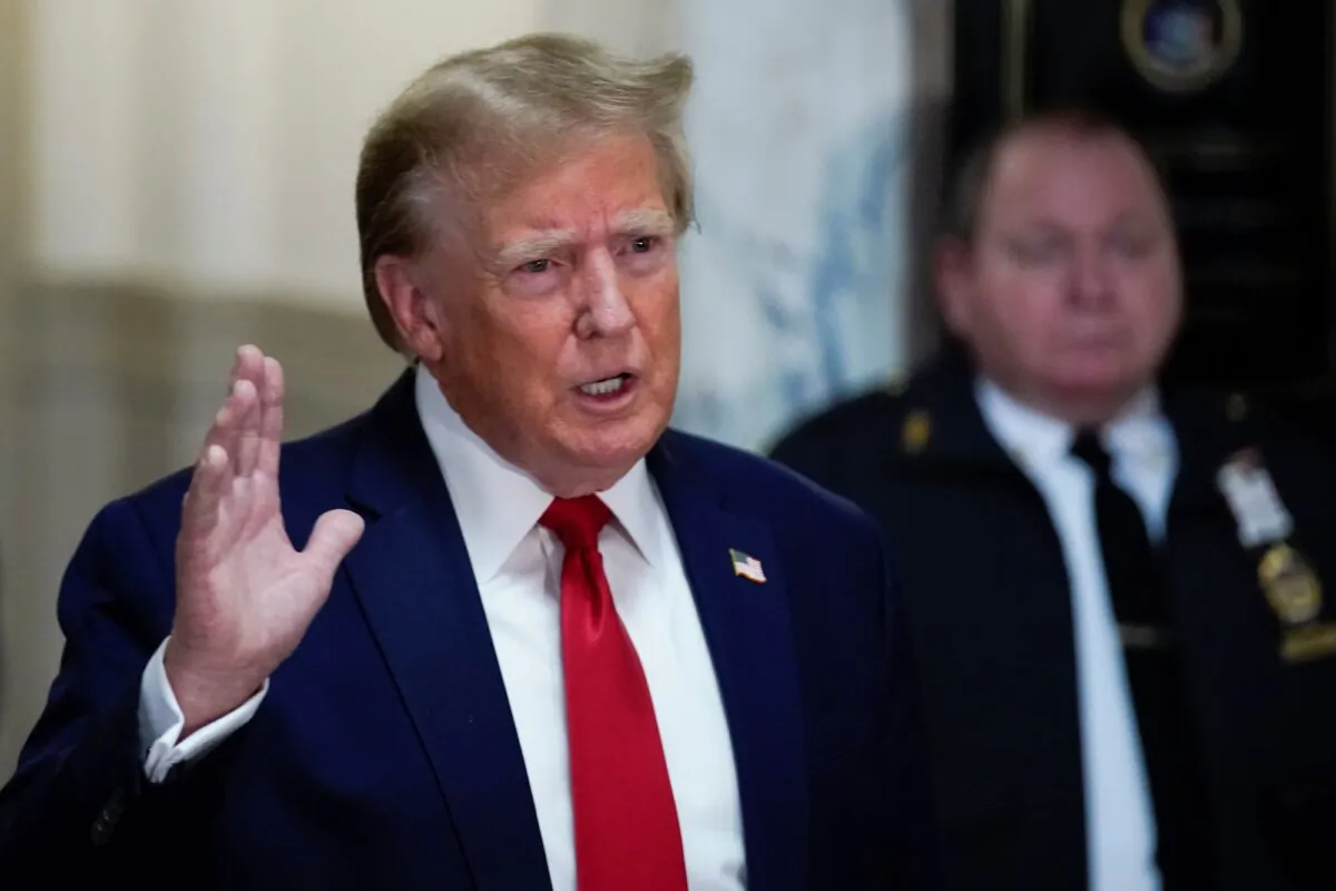 Former U.S. President Donald Trump speaks after arriving for his civil business fraud trial in New York State Supreme Court on December 7, 2023 in New York City. Trump's civil fraud trial alleges that he and his two sons Donald Trump Jr. and Eric Trump conspired to inflate his net worth on financial statements provided to banks and insurers to secure loans. New York Attorney General Letitia James has sued seeking $250 million in damages. (Photo by Eduardo Munoz Alvarez-Pool/Getty Images)