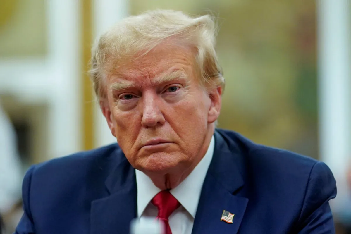 Former U.S. President Donald Trump sits at the defense table while waiting for proceedings to begin in his civil business fraud trial in New York State Supreme Court, in New York City, on Dec. 7, 2023. (Eduardo Munoz Alvarez-Pool/Getty Images)