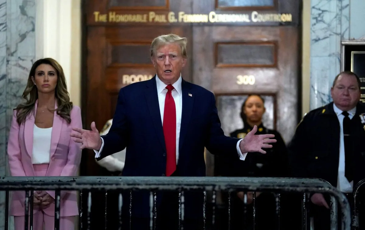 Former U.S. President Donald Trump speaks to members of the media as he arrives at the New York State Supreme Court during the civil fraud trial against the Trump Organization, in New York City, on Dec. 7, 2023. (Timothy A. Clary/AFP via Getty Images)