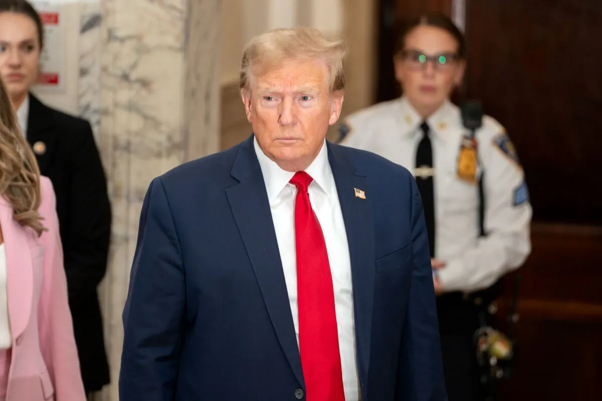 Former President Donald Trump speaks to the media while attending his trial in New York State Supreme Court in New York City, on Dec. 7, 2023. (David Dee Delgado/Getty Images)