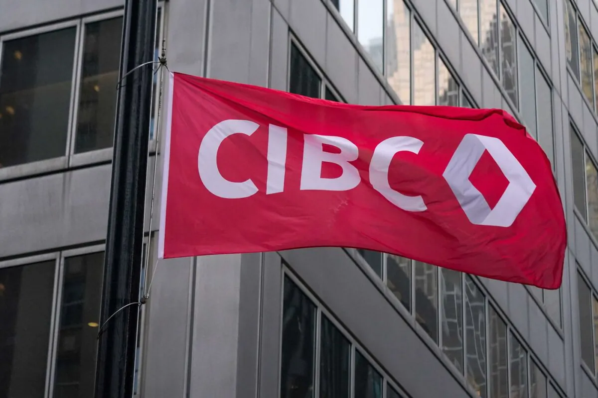 The CIBC logo is displayed on a flag in front of its headquarters in Toronto on Oct. 25, 2021. (The Canadian Press/Evan Buhler)