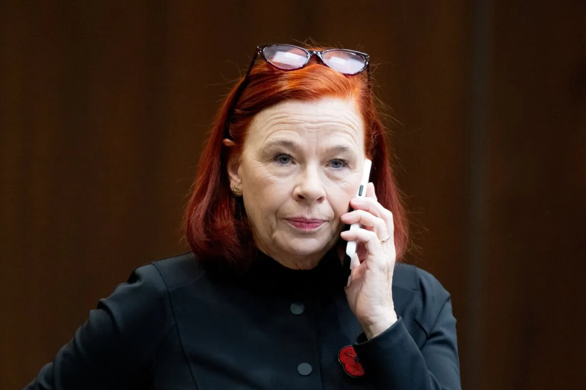 Catherine Tait, president and CEO of the Canadian Broadcasting Corporation (CBC) talks on the phone before appearing at the Standing Committee on Canadian Heritage in Ottawa, on Nov. 2, 2023. (The Canadian Press/Spencer Colby)