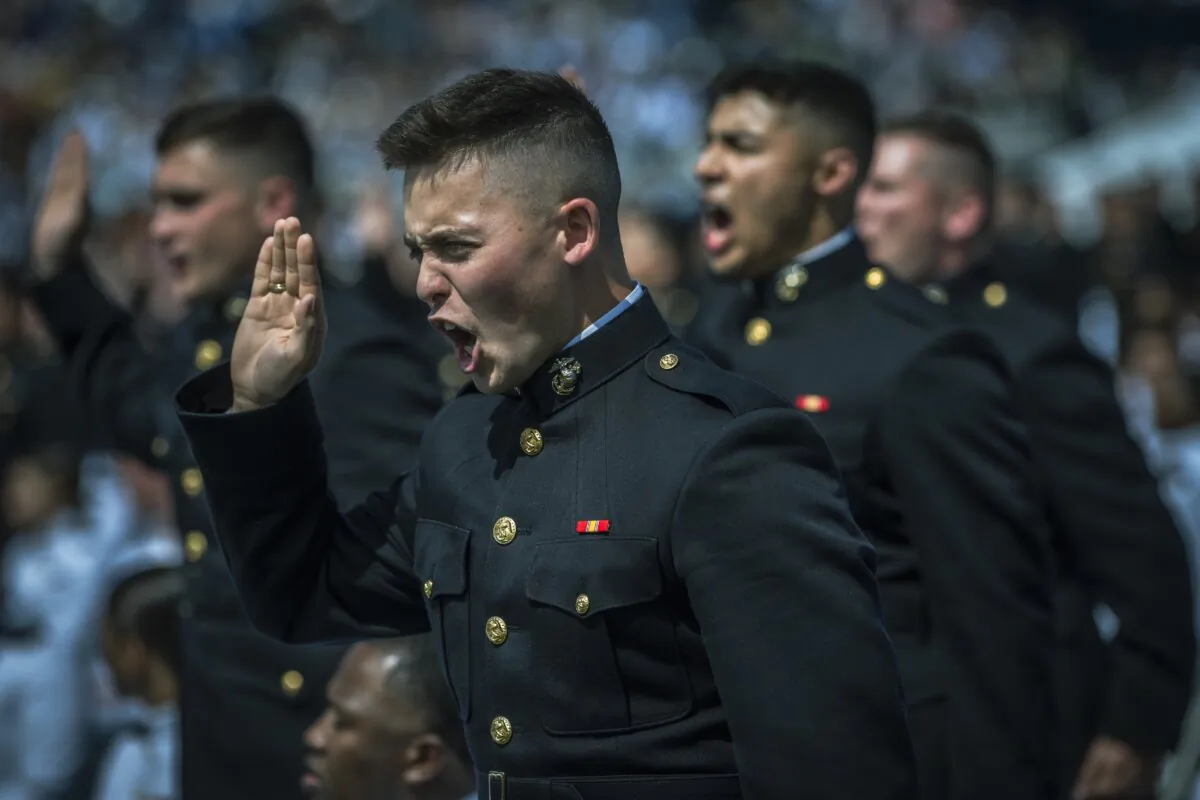 Newly commissioned U.S. Marine Corps 2nd Lieutenants take the oath of office during the U.S. Naval Academy's Class of 2023 graduation ceremony at Navy-Marine Corps Stadium, Annapolis, Md., May 26, 2023. (Chad J. McNeeley, Joint Staff Public Affairs)