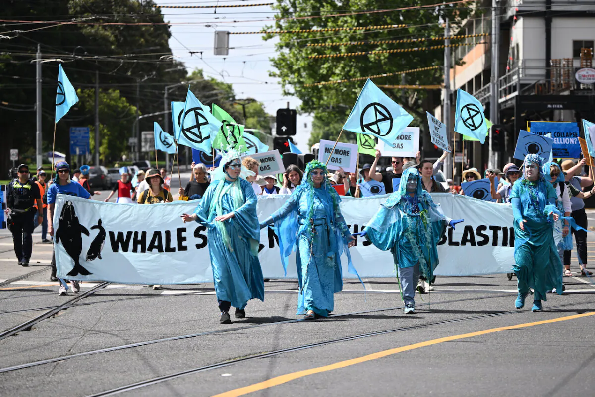 Members of Extinction Rebellion arrive during a protest outside the Victorian Department of Environment, Energy and Climate Action in Melbourne, Australia on Dec. 7, 2023. (AAP Image/Joel Carrett)