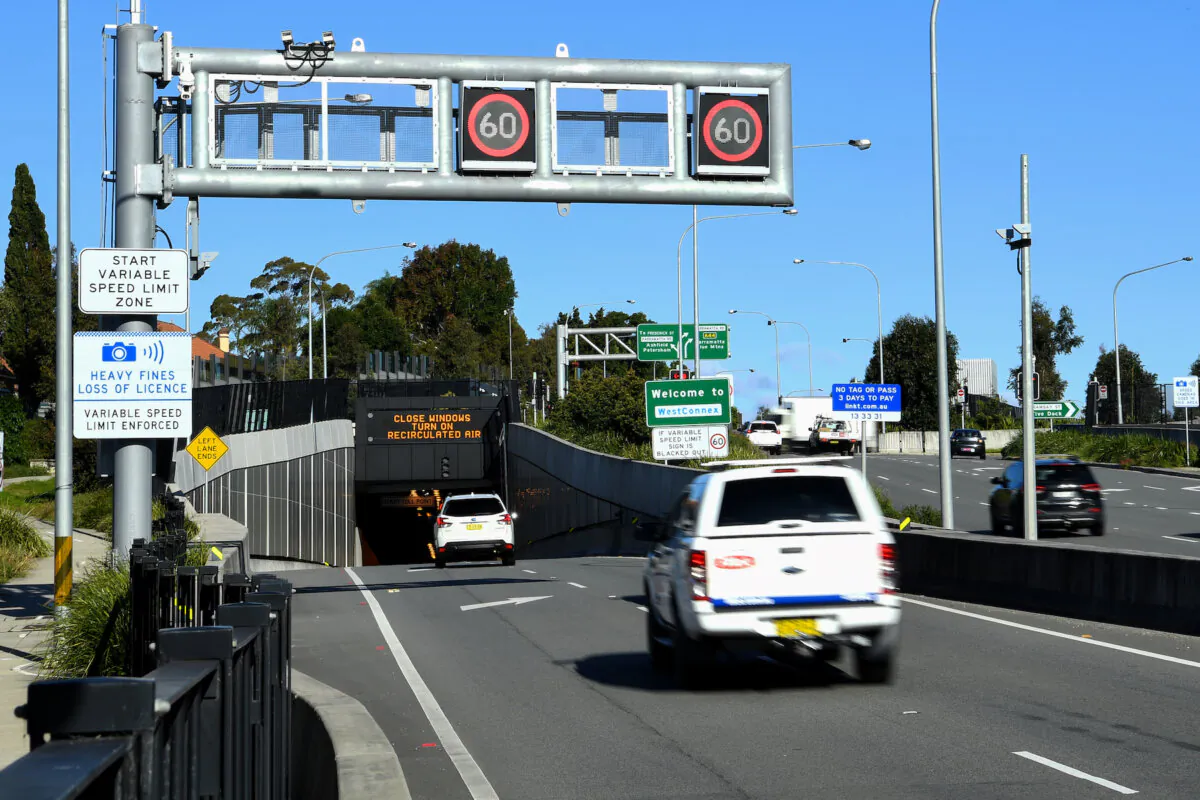 Vehicles are seen at the WestConnex M4 tunnel entrance at Haberfield in Sydney, June 7, 2022. (AAP Image/Bianca De Marchi)