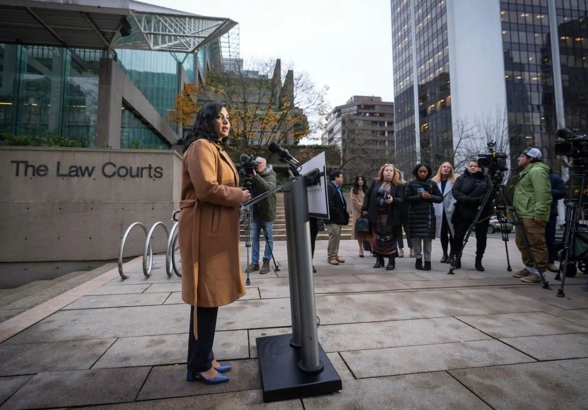 B.C. Attorney General Niki Sharma holds a press conference outside the B.C. Supreme Court in Vancouver on Nov. 27, 2023. (The Canadian Press/Darryl Dyck)