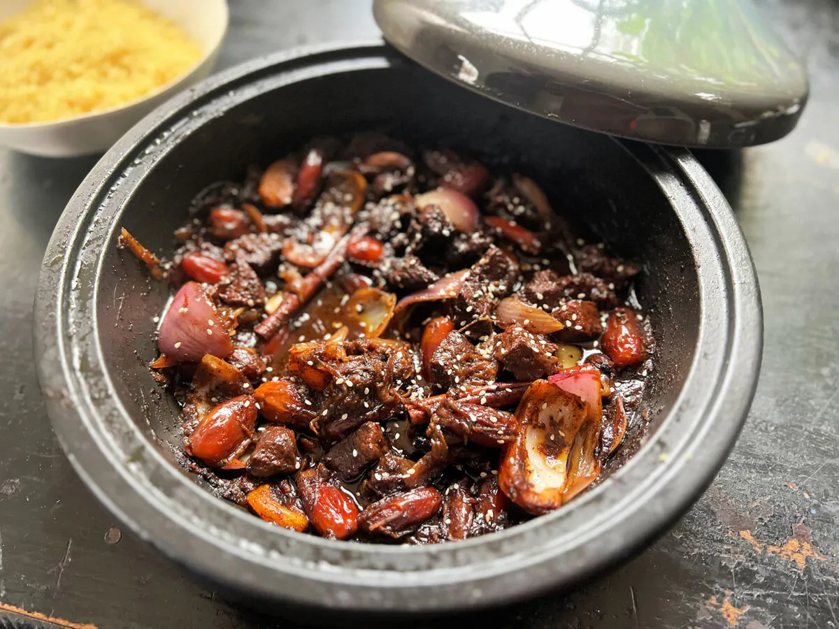 Dates, commonly known as the "bread of the desert" in the Middle East, give a sweet supporting hand to this easy lamb tagine. (Gretchen McKay/Pittsburgh Post-Gazette via TNS)