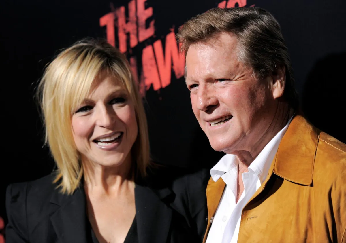 Tatum O'Neal, (L), a cast member in "The Runaways," and her father, actor Ryan O'Neal, pose together at the premiere of the film in Los Angeles on March 11, 2010. (Chris Pizzello/AP Photo)