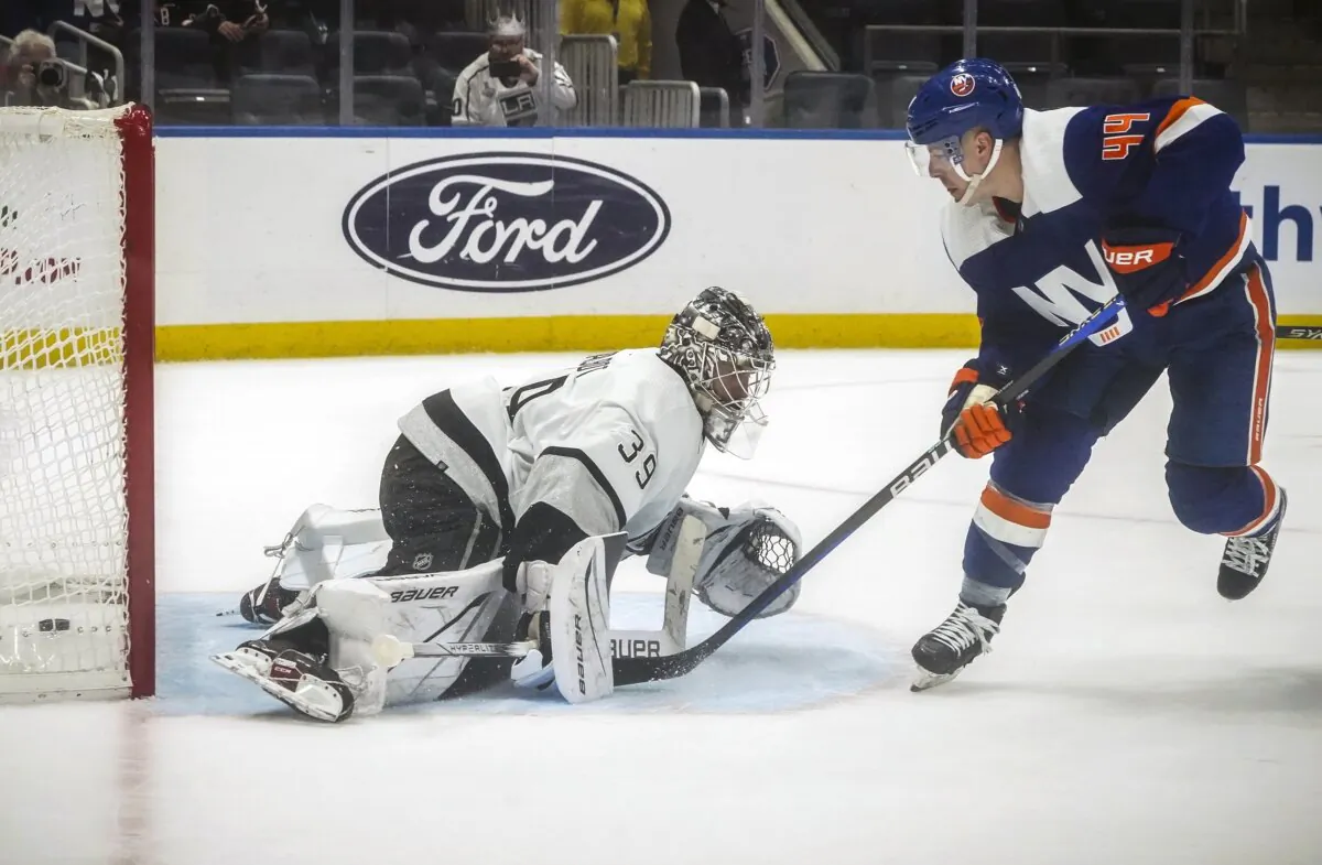New York Islanders' Jean-Gabriel Pageau (R) scores against Los Angeles Kings' Cam Talbot for an overtime win of an NHL hockey game in Elmont, N.Y., on Dec. 9, 2023. (Bebeto Matthews/AP Photo)